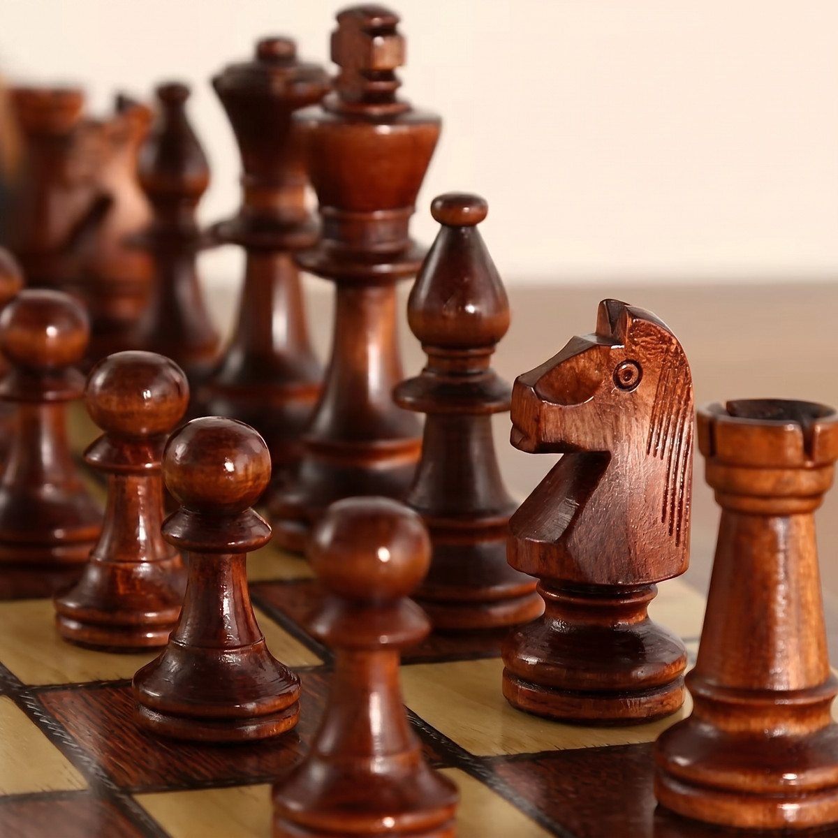 Close-up of the knight and pawns in dark stained wood