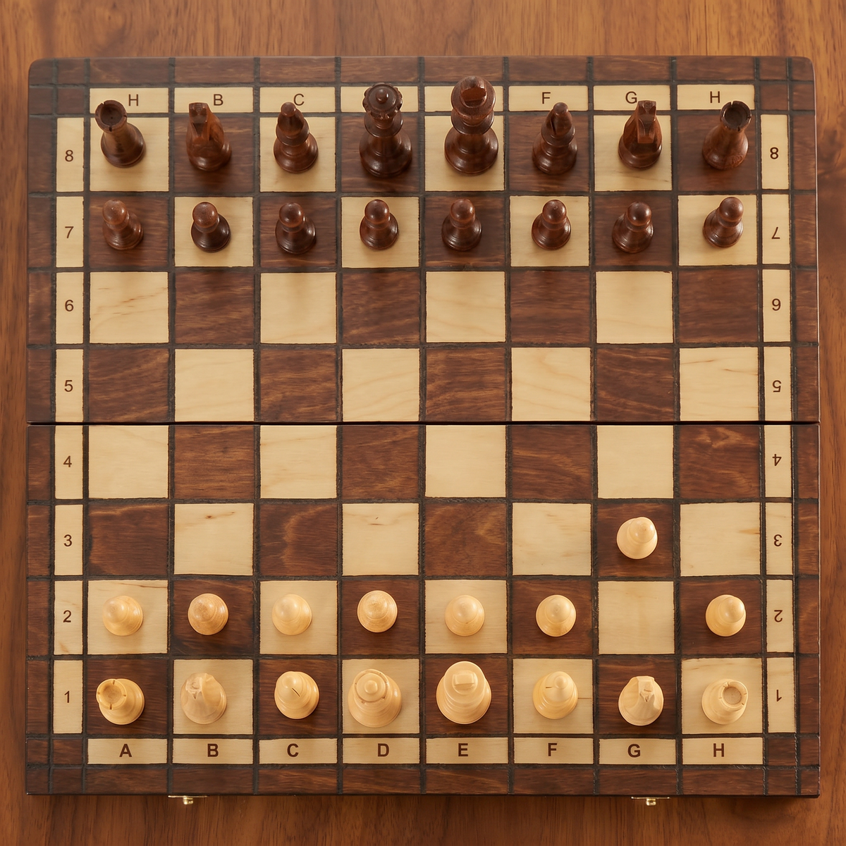 Board seen from above, the hinge line across the centre